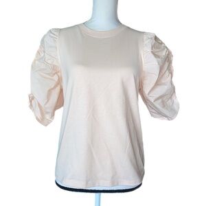 FRAME light peach ruched sleeve top.